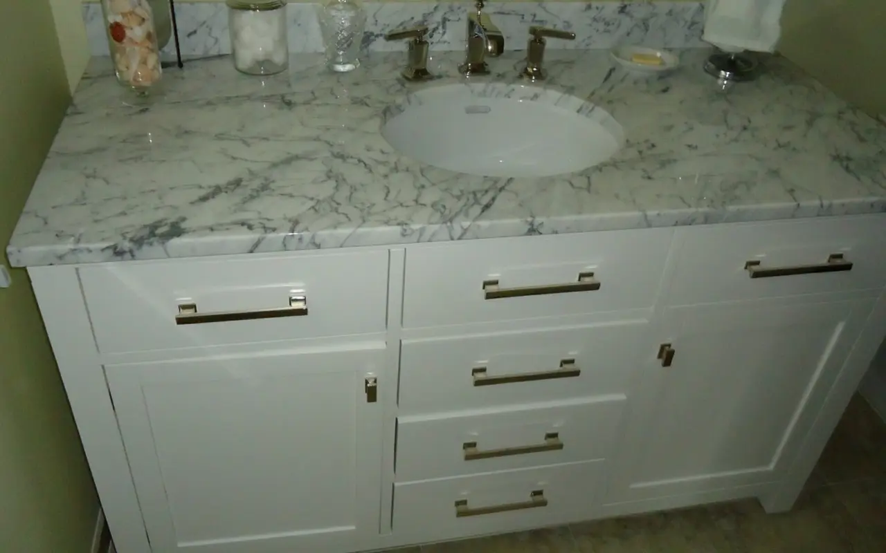 Bathroom vanity cabinet with sink and drawers